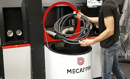 Outfeed of pre-wired sheaths from the MECASPIN machine